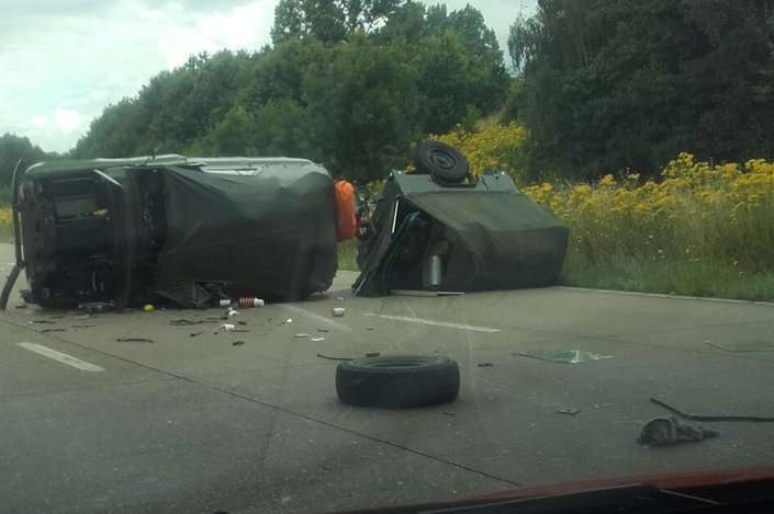 The overturned military vehicle on the M20. Photo: @mrswarboys