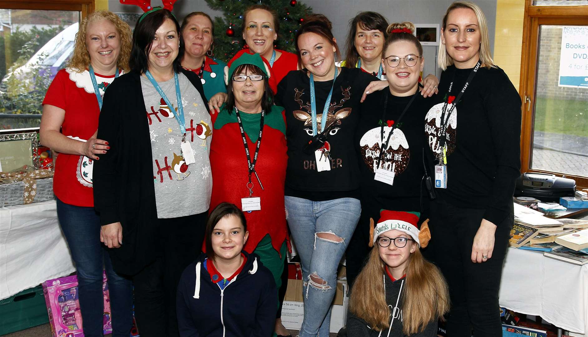 Platters Farm Lodge manager Becky Richards, centre, with staff and volunteers at their recent Christmas fair