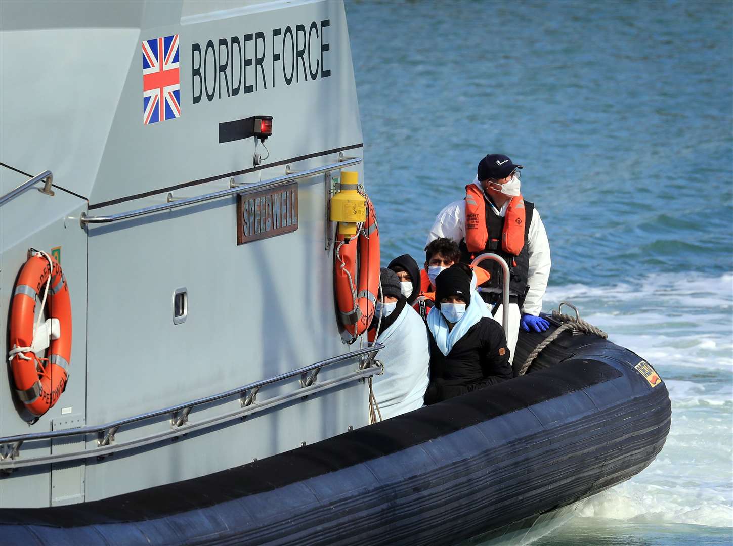 A group of people thought to be migrants are brought into Dover by Border Force (Gareth Fuller/PA)