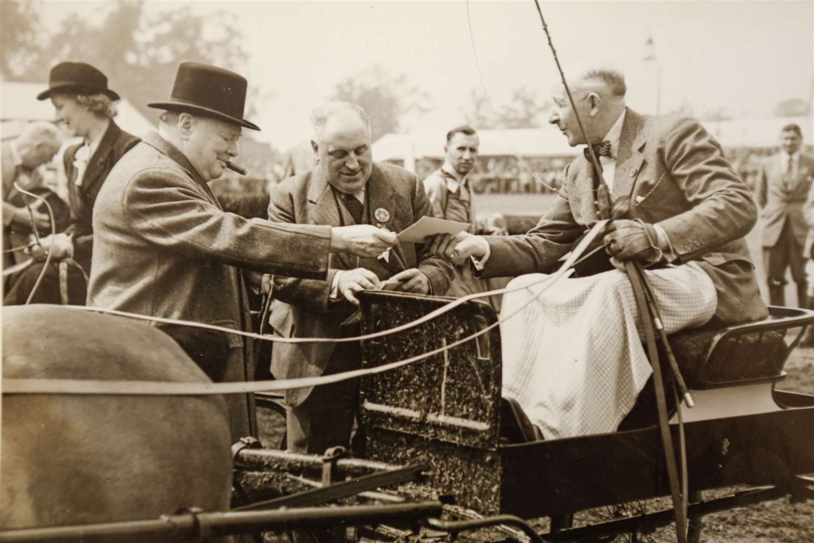 Ann Gilbert and Derek Moore with their pictures of Winston Churchill at The Kent County Show held at that time in Mote Park, Maidstone. Picture: KM archives