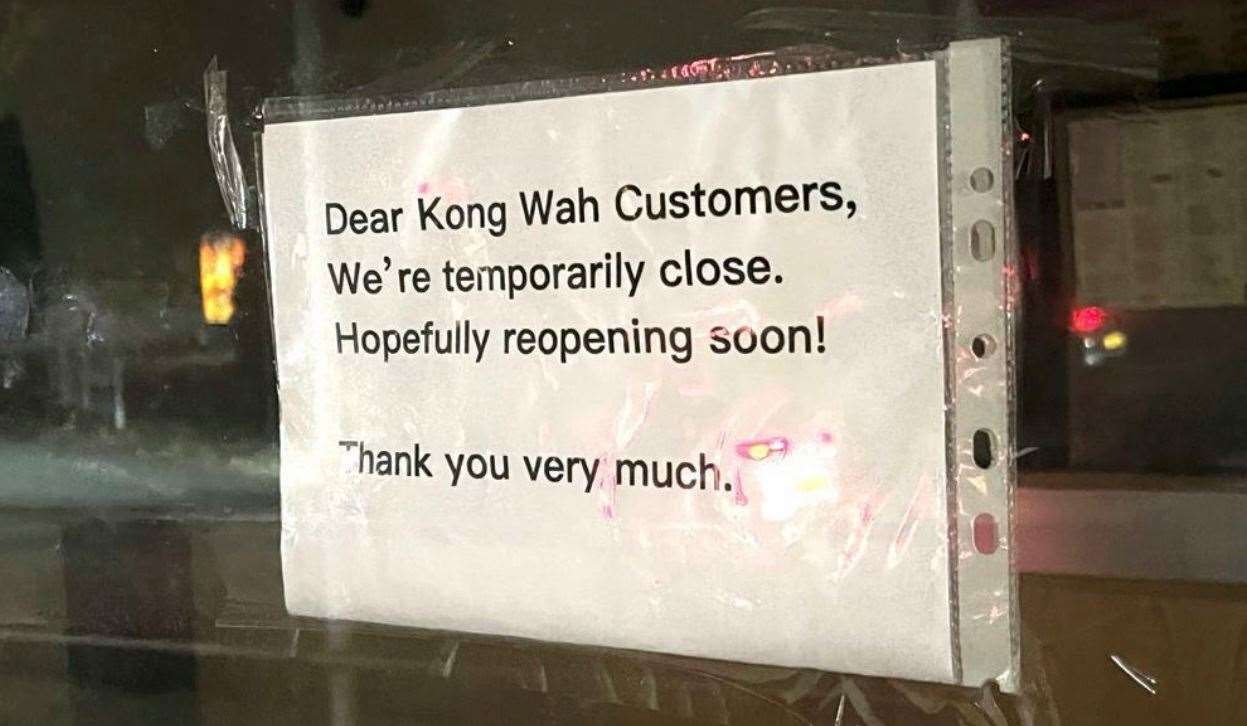 The sign left at Kong Wah when it shut earlier this year. Picture: Joe Harbert
