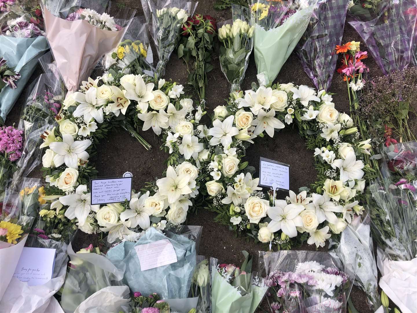 Floral tributes have been left at the war memorial