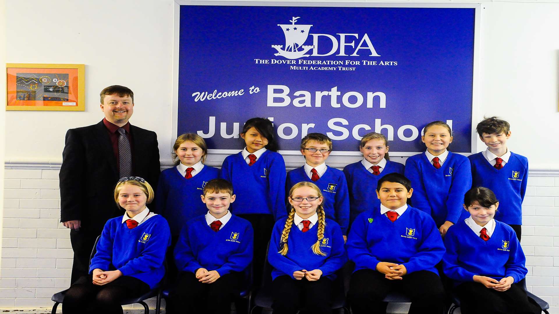 Principal, David Meades, with pupils from Barton Junior School
