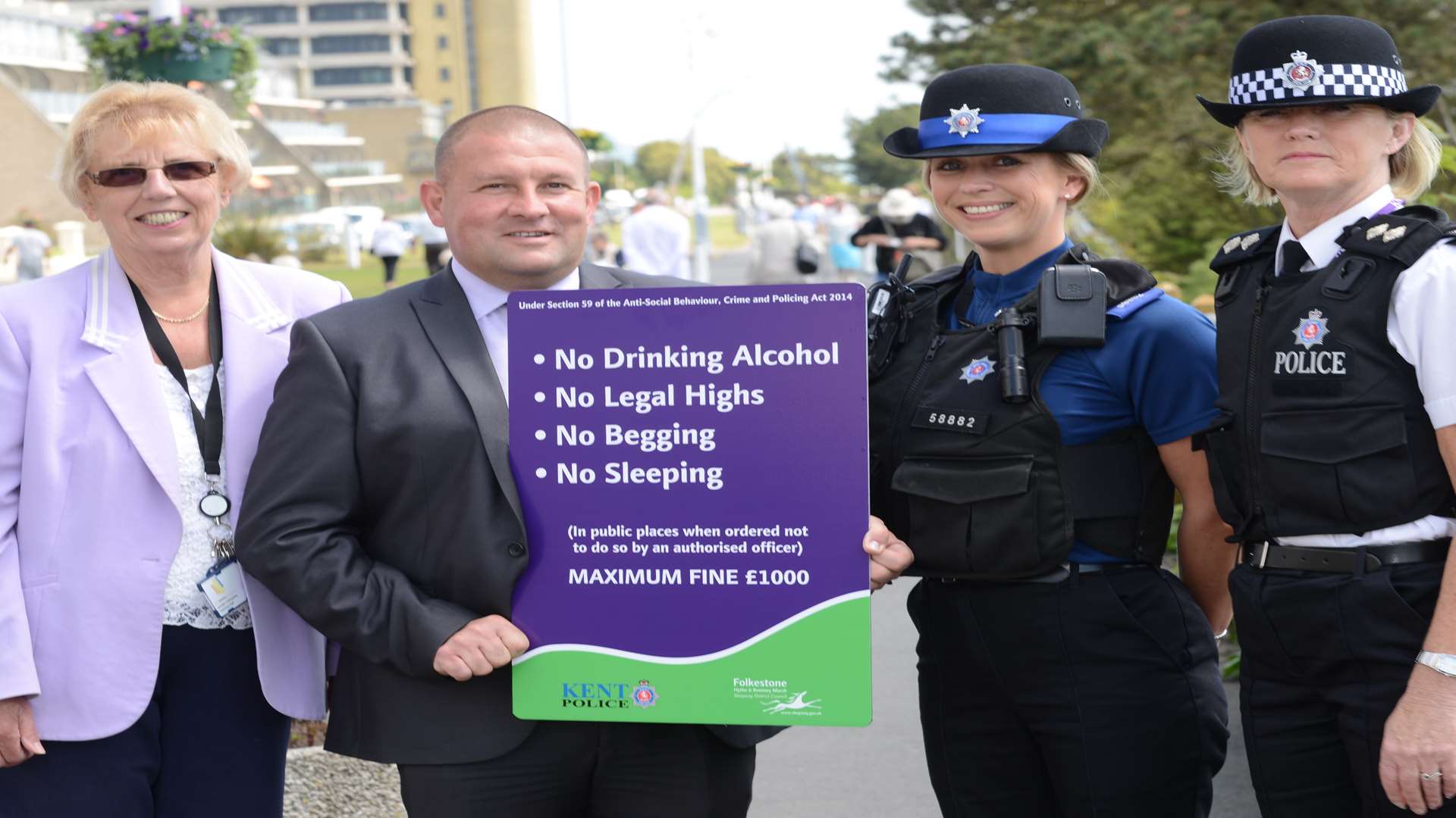 Jenny Hollingbee, Shaun Taylor, PCSO Sarah Leivers and acting inspector Emma Moloney from Kent Police with the new signs that will go up around Folkestone