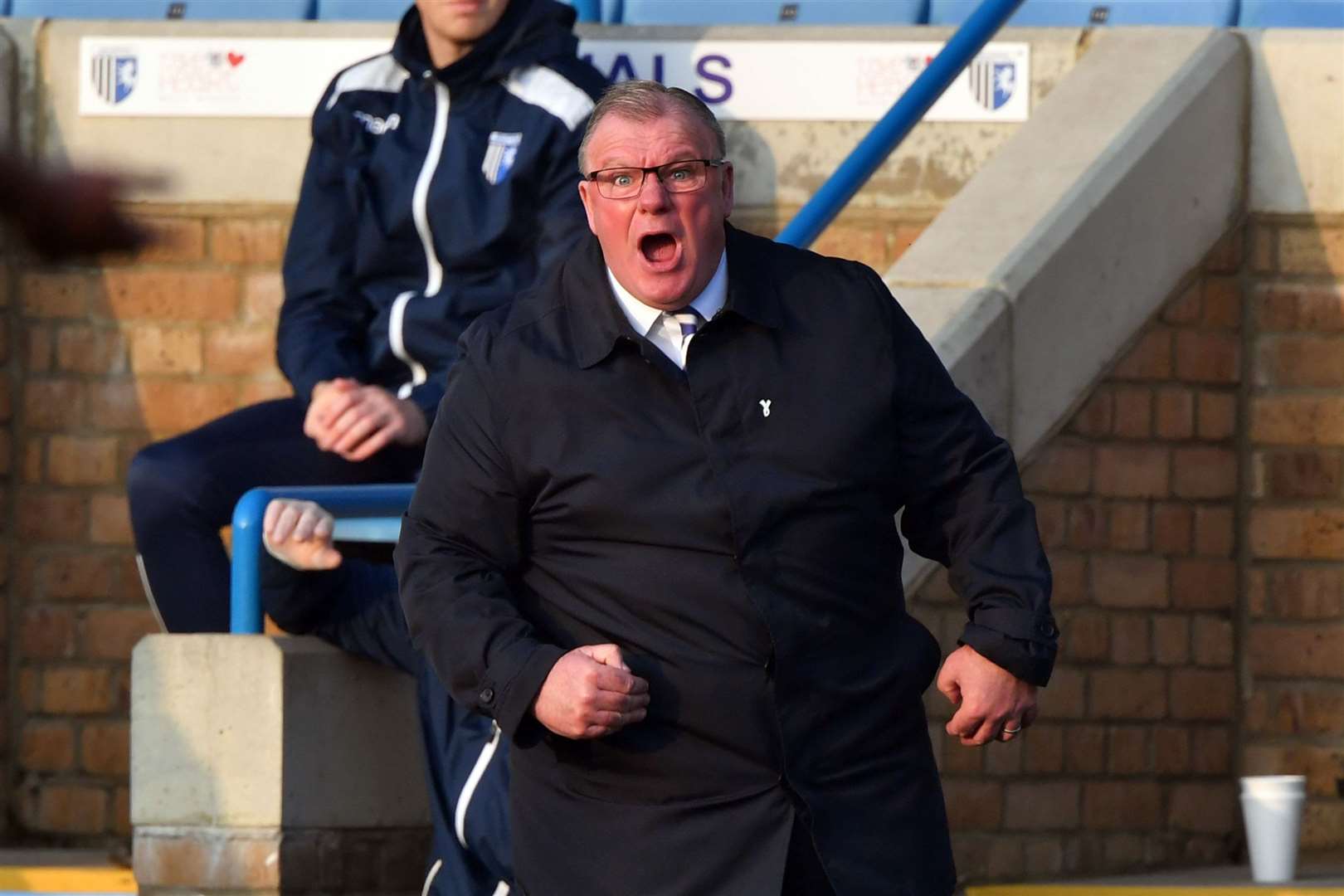 Steve Evans getting involved from the touchline