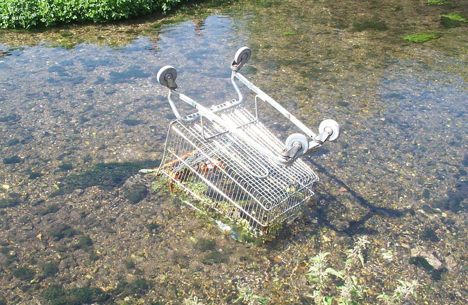 A shopping trolley dumped in the River Medway