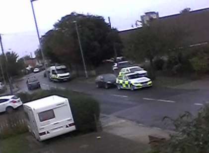 Police presence in Millmead Road. Picture uploaded to Twitter by Rowena Relf