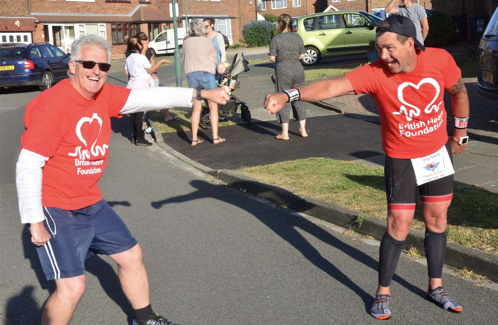Traviss Whitehead (left) and Martin Fuller during their Iron Man challenge