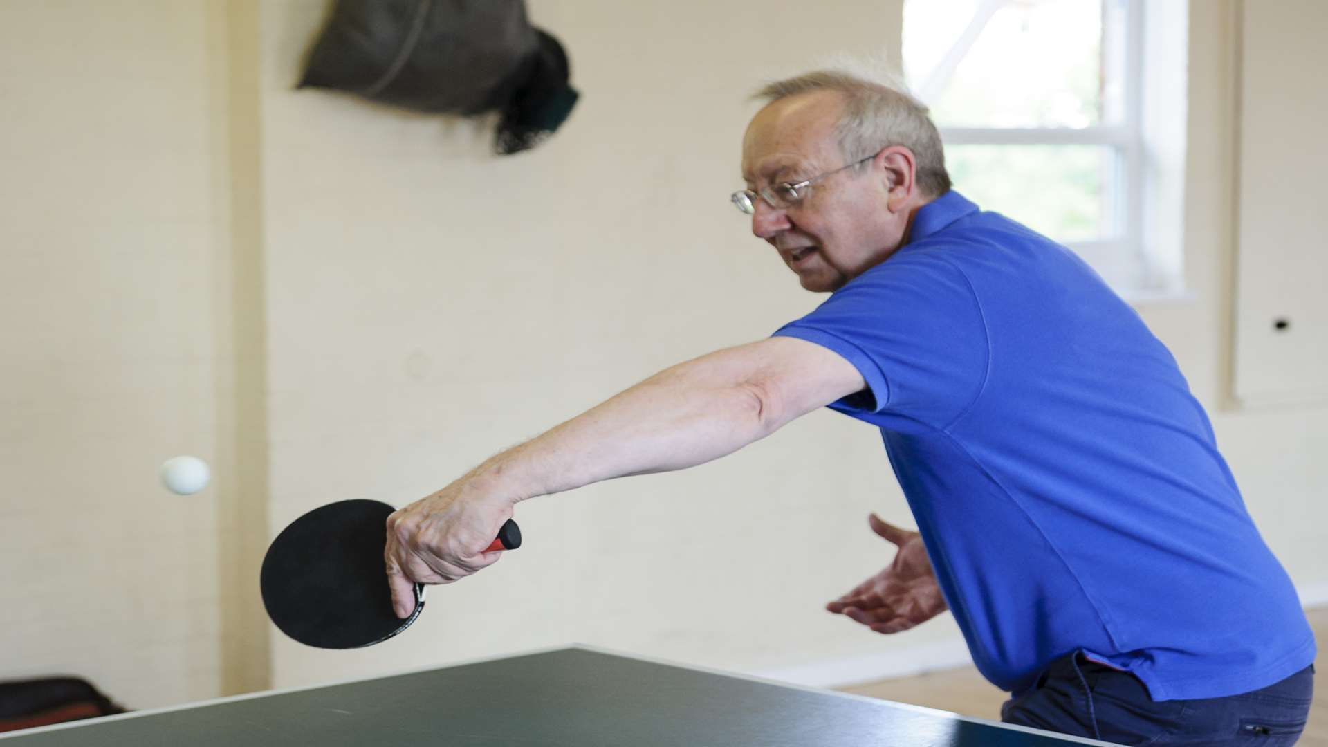 Cllr Butler plays the winning shot