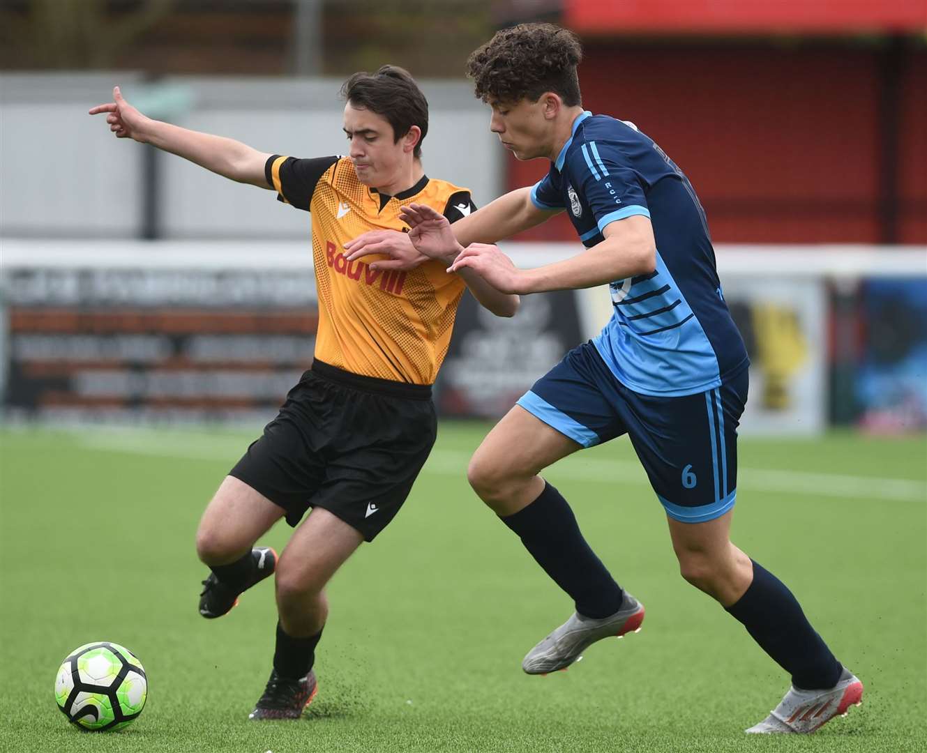 The teams battle for midfield possession in the Kent Merit Under-14 boys cup final. Picture: PSP Images