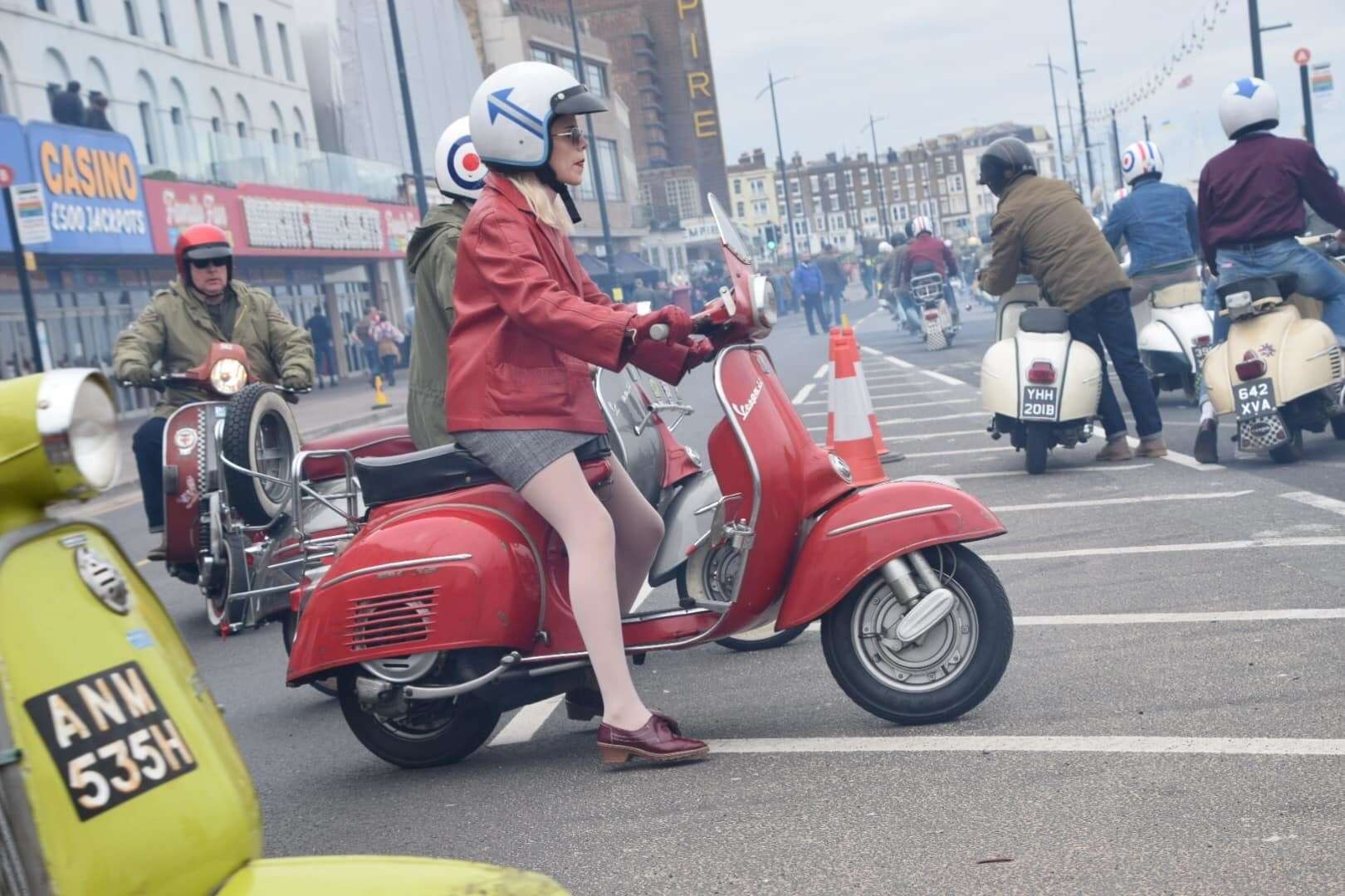 A woman dressed in red was seen among the group of mods. Picture: Roberto Fabiani