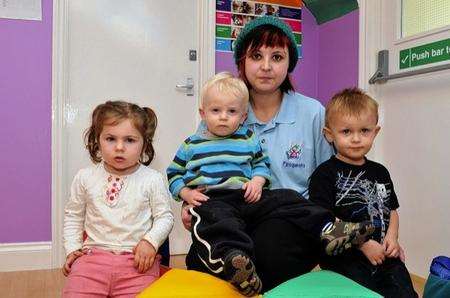 Baby Room Supervisor Jemma Payne, with L/R Gemma, 2, Tyler, 19 mths and Rocco, 2