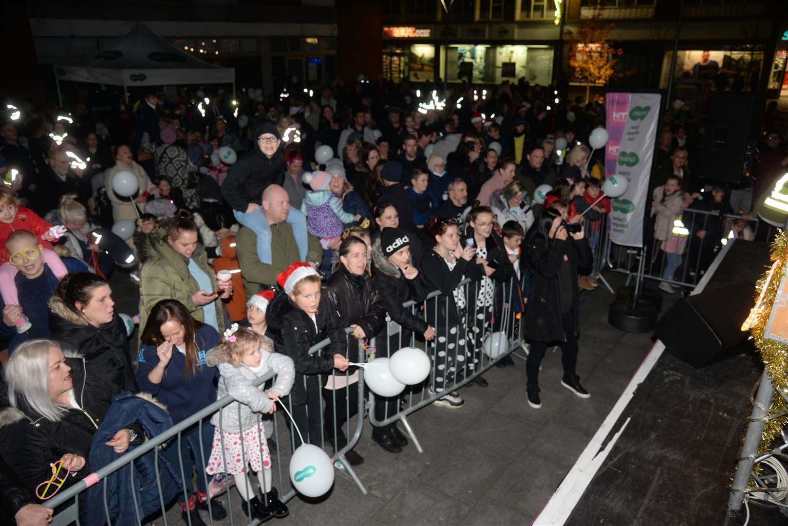 Spectators at the Christmas lights switch-on join in the festive fun. Picture: Chris Davey