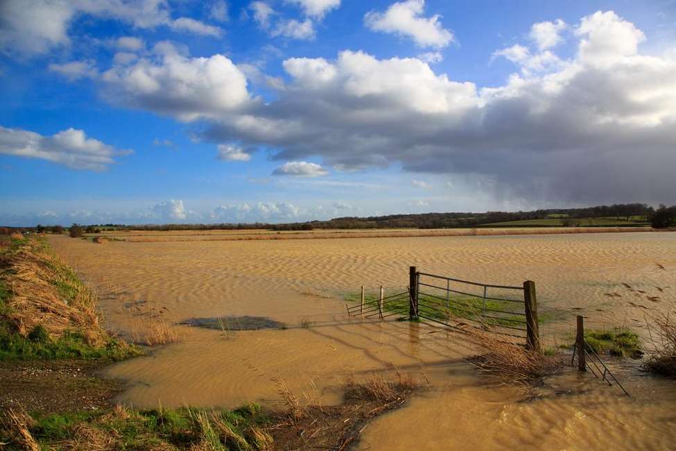 Many Kent fields, including this one at Smallhythe, were left under water. Picture: Stuart Kirk