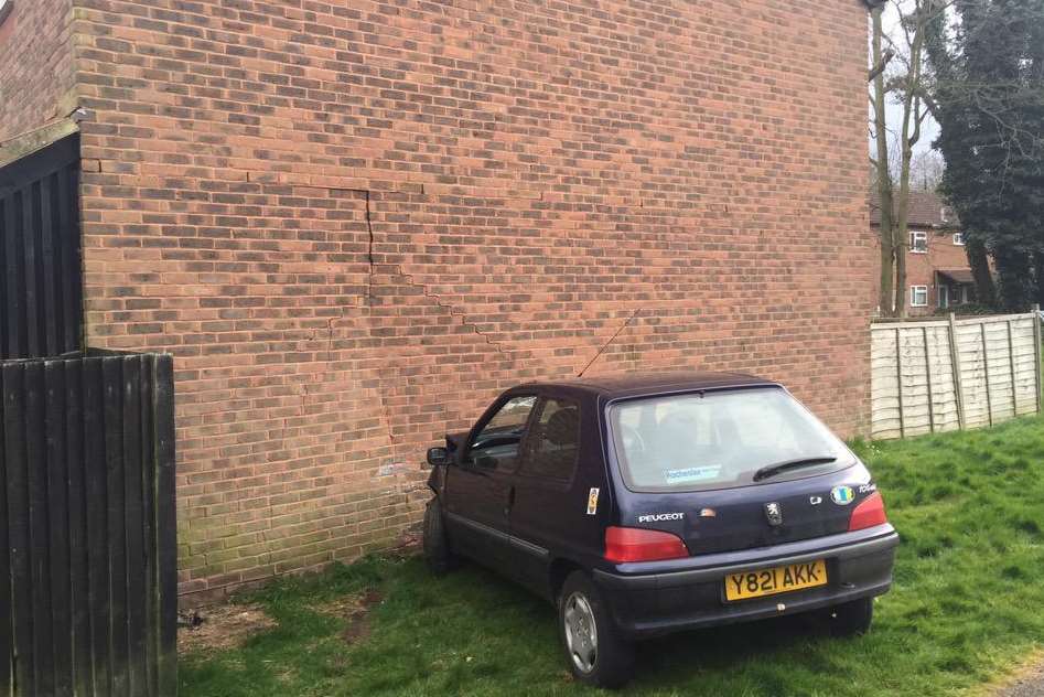 Car drives into a house in Barnes Close. Picture: Twitter @Kent_999s