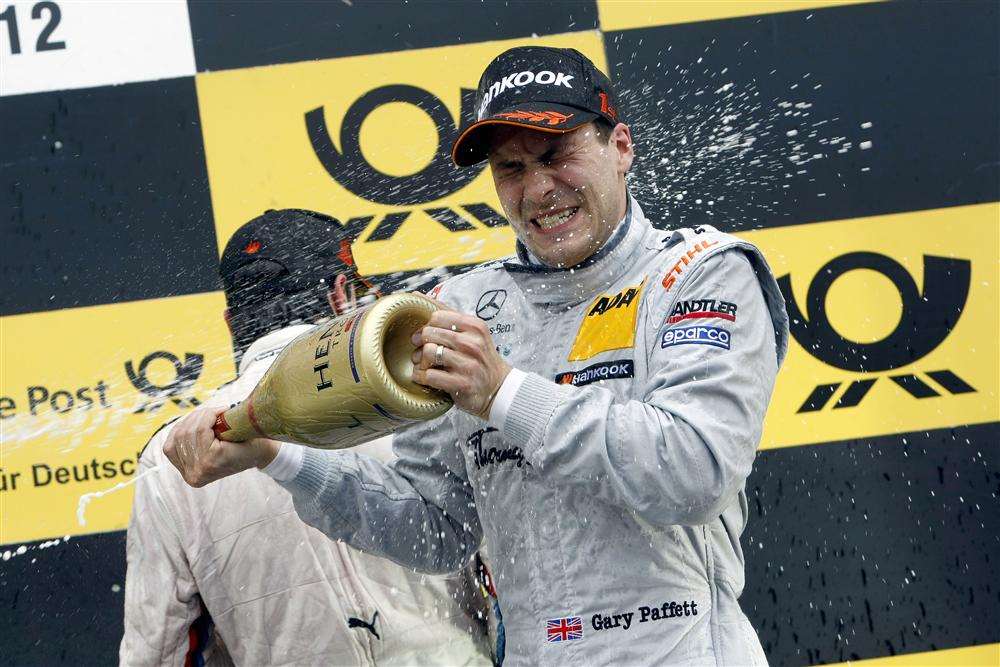 Gary Paffett celebrates a DTM victory at Brands Hatch in 2012
