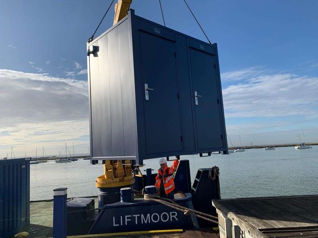 The new solar loos are craned into position on Queenborough Harbour's pontoon. Picture: Queenborough Harbour