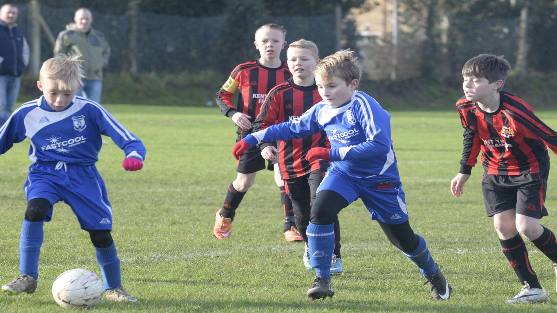 Woodcoombe under-11s watch on as New Road take possession in their League Cup clash Picture: Chris Davey