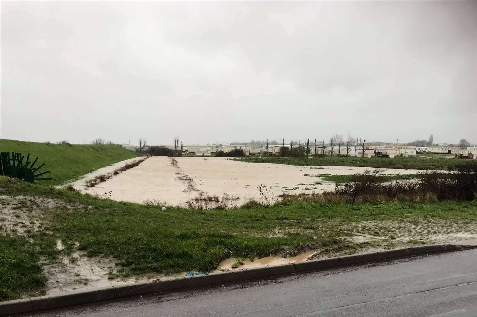 Fields along Warden Bay Road, Warden, have also flooded. Picture: Danny Street