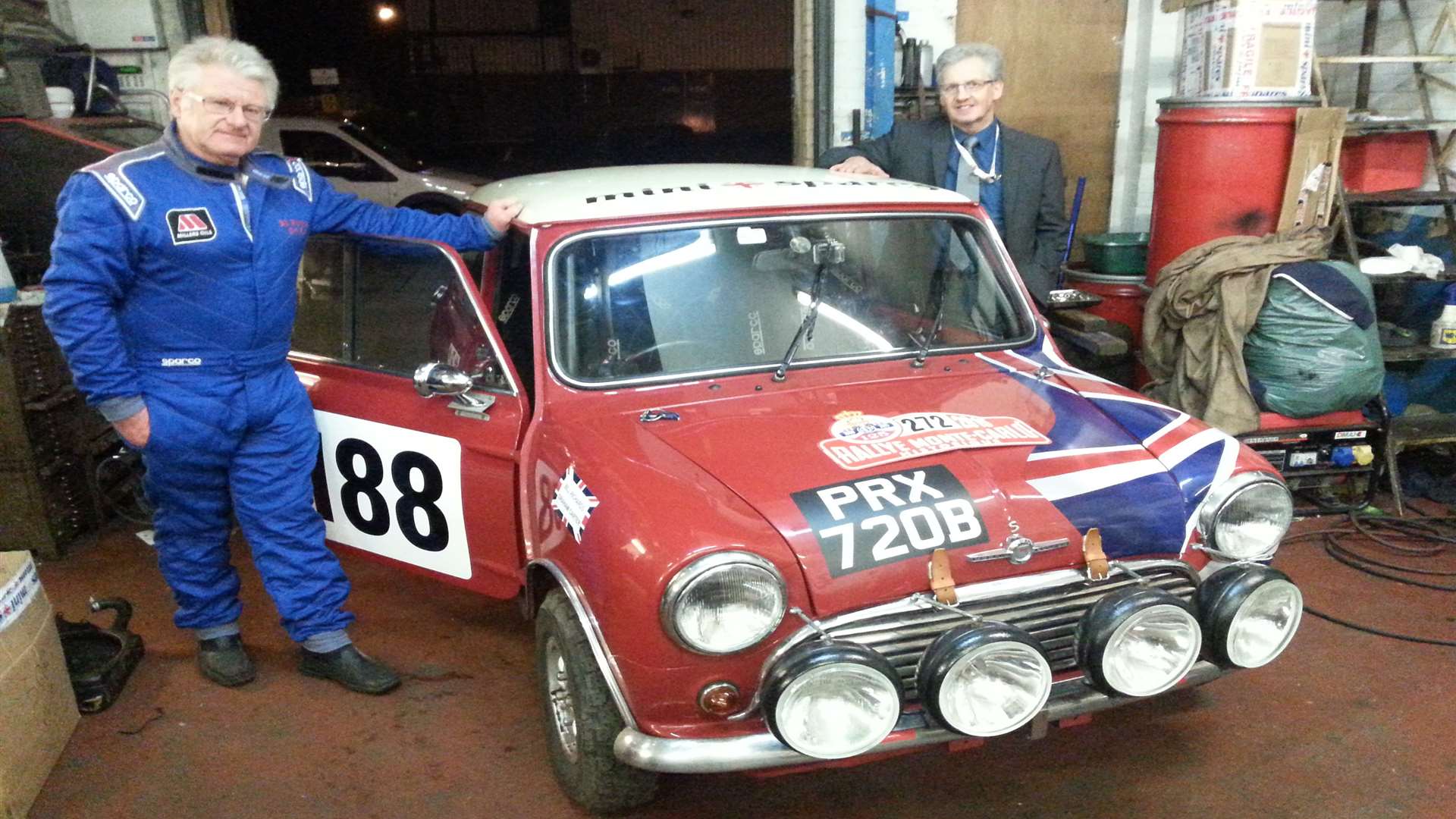 Bill Richards (left) and navigator Graham Carter pictured with their Mini Cooper S on Monday evening