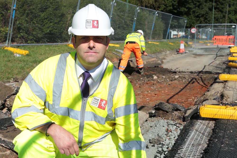 Re-surfacing manager Alan Casson alongside the high-tec new road
