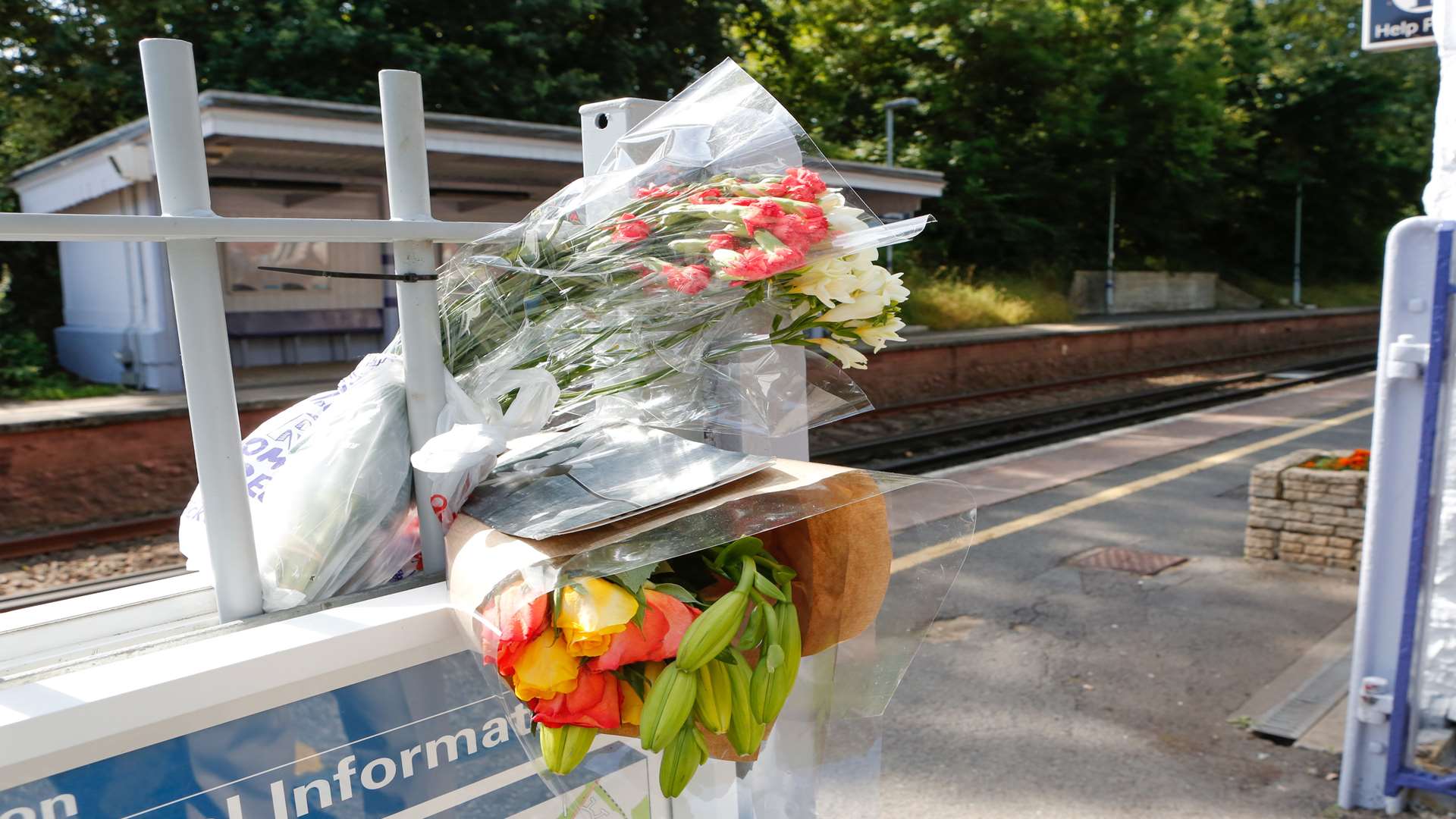 Flowers left at Barming railway station in memory of Duncan Keen. Picture: Matthew Walker