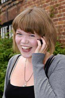 Emily Burton calls her mum to tell of her 3 A stars. Ashford School, East Hill. Pupils recieve their A-Level results