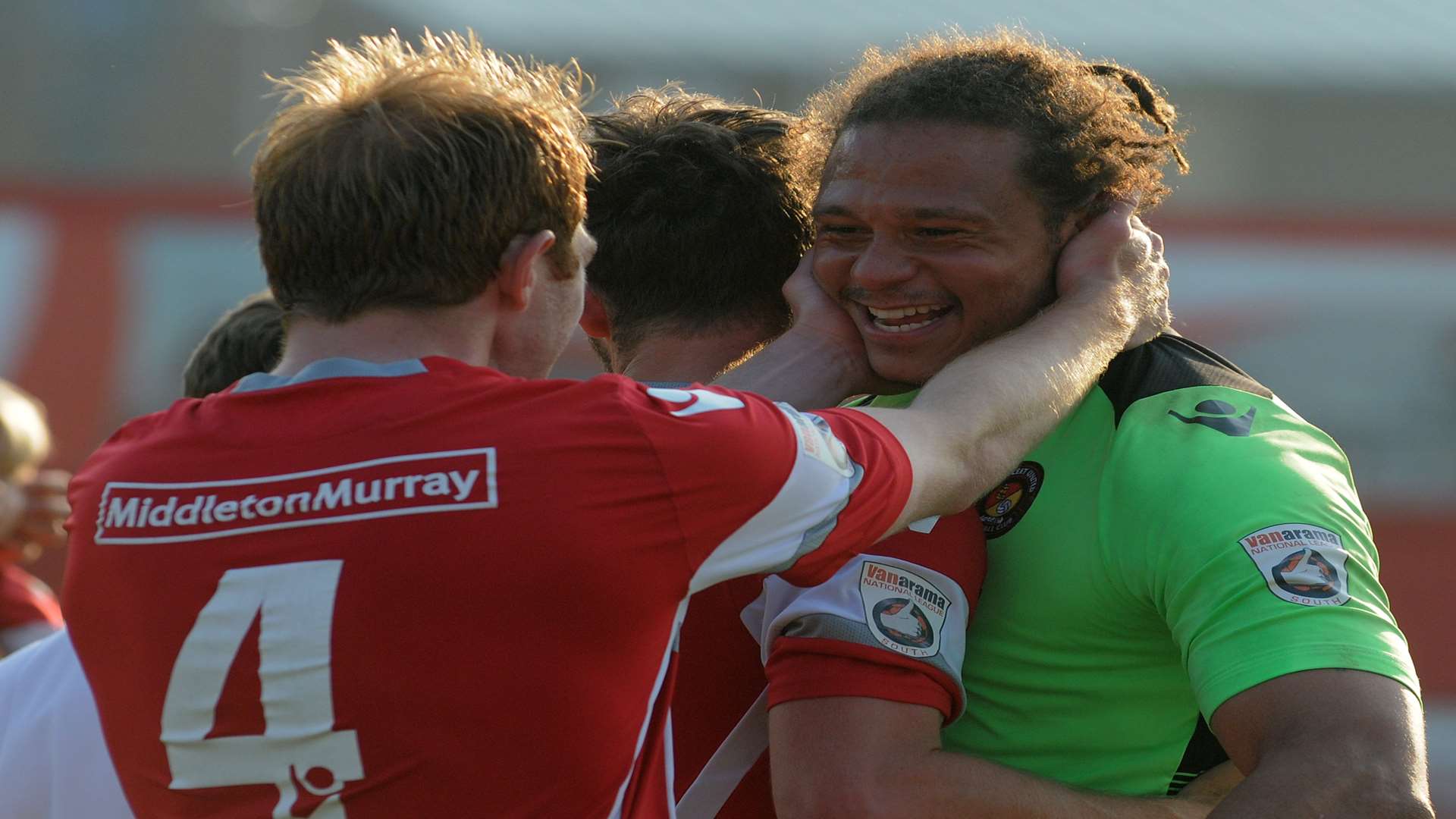 Stuart Lewis embraces Nathan Ashmore after the penalty shootout Picture: Ruth Cuerden