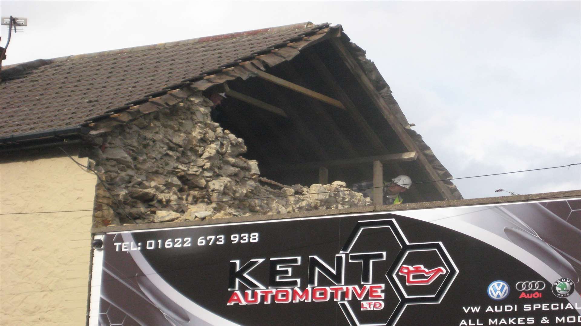 The wall of a house fell onto a business in Cross Street, Maidstone
