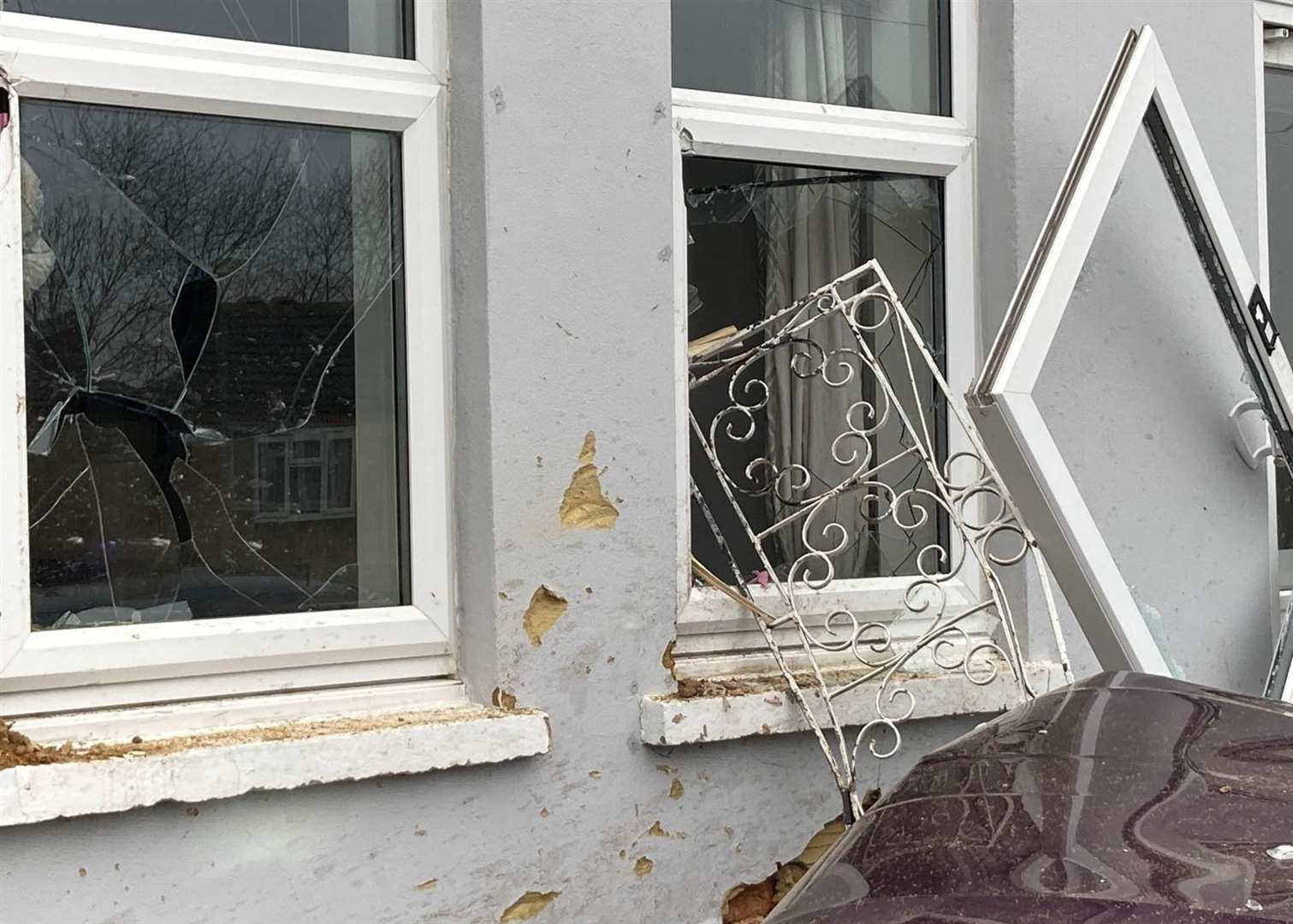 The family's windows were smashed as a result of the crash on Sheppey. Picture: John Nurden