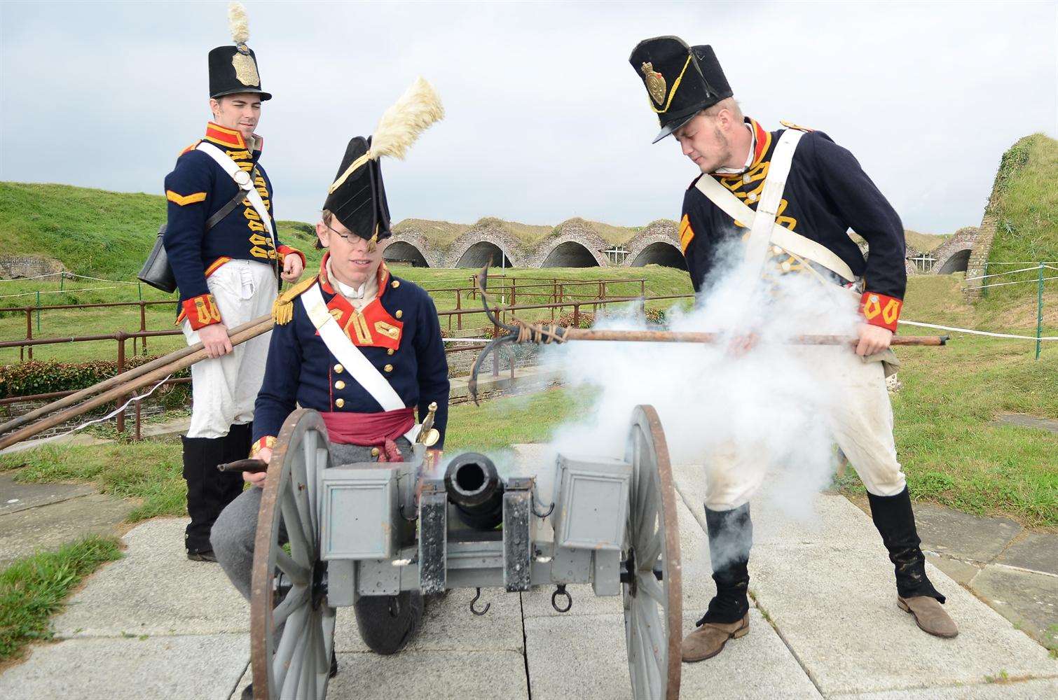 Richard Hiatt, Philip Jopson and Chris Bassett from the 4th Battalion Royal Foot artilery fire the canon at Dover Western Heights