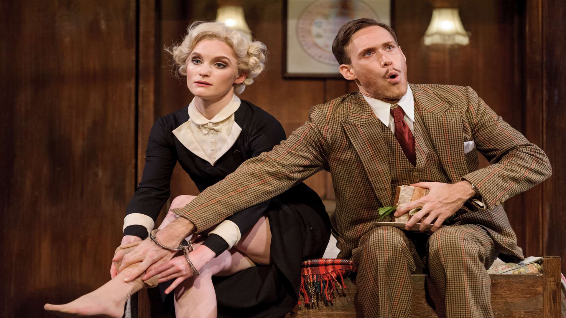Richard Ede, as Richard Hannay and Olivia Greene, in one of the three character roles she plays in the comedic version of 39 Steps playing at The Orchard Theatre
