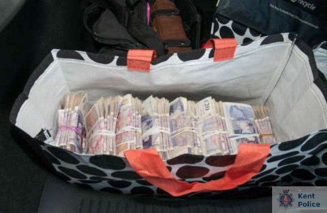 Cash found in the back of the Renault Megane. Picture: Kent Police