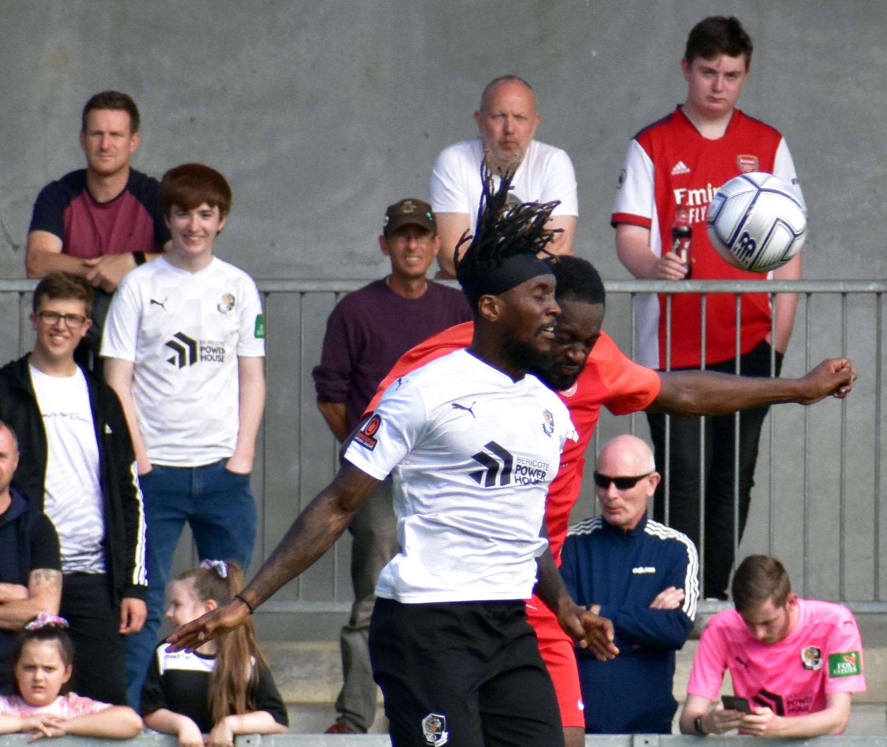 Darts striker Ade Azeez challenges against Hythe in the FA Cup. Picture: Randolph File (51548496)
