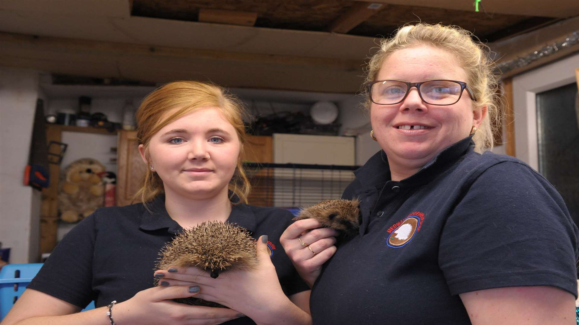 Kelly Smith and Tayla Rogers, 16, with the hedgehogs