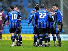 Gillingham players celebrate Curtis Weston's opening goal in their 1-1 draw with Bury at Priestfield