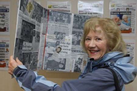 Betty Oldmeadow with the collage she made for the paper's 150th anniversary
