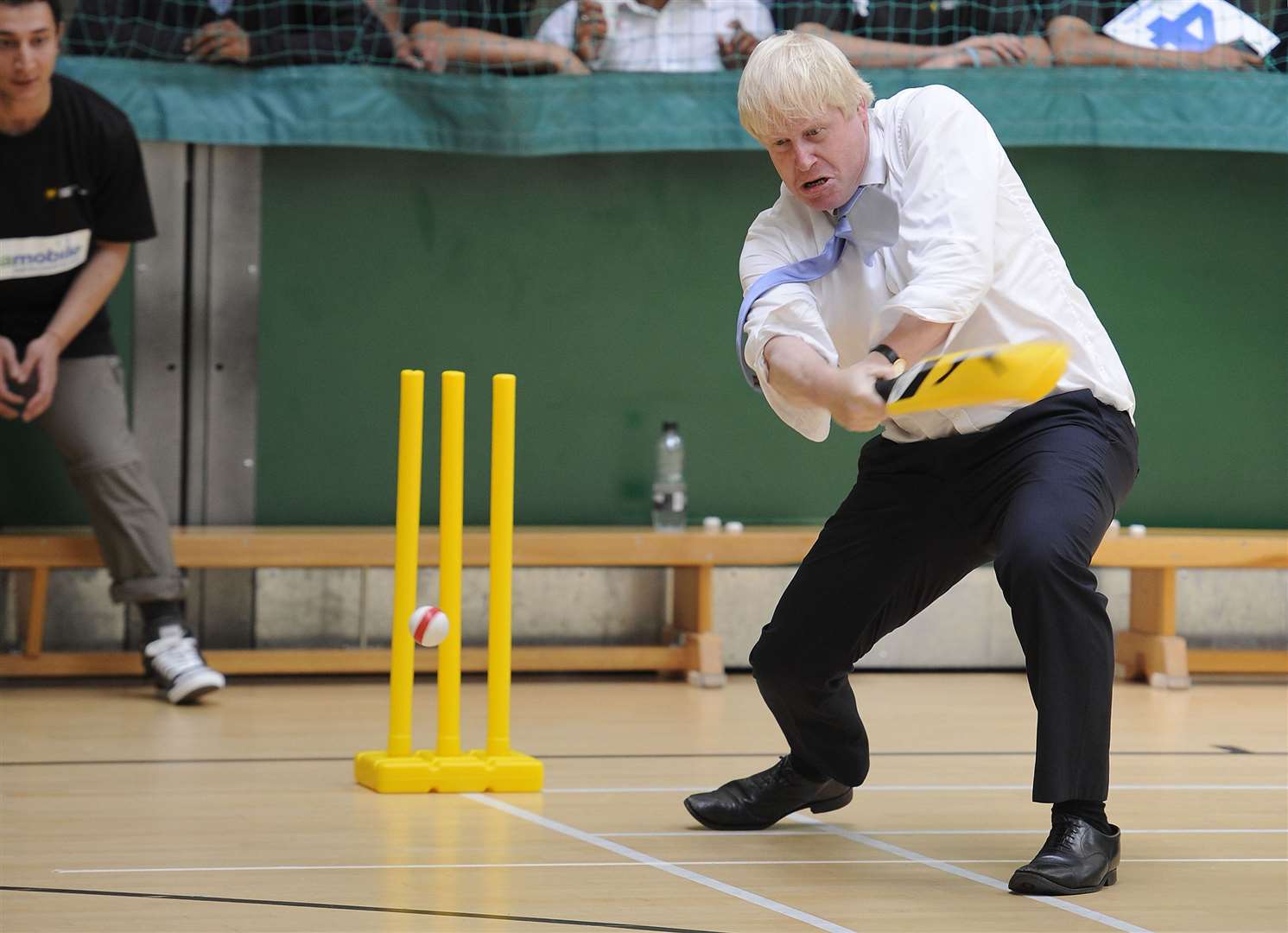 Taking part in a street cricket tournament in aid of charity in 2015 (Lauren Hurley/PA)
