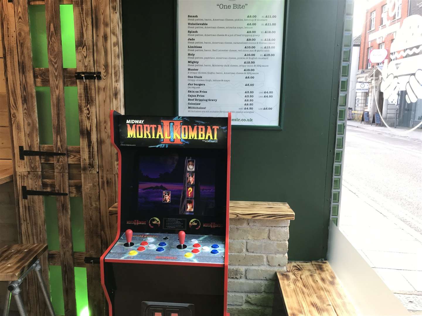 The old arcade machine sits in the corner waiting to be played by anyone with the time