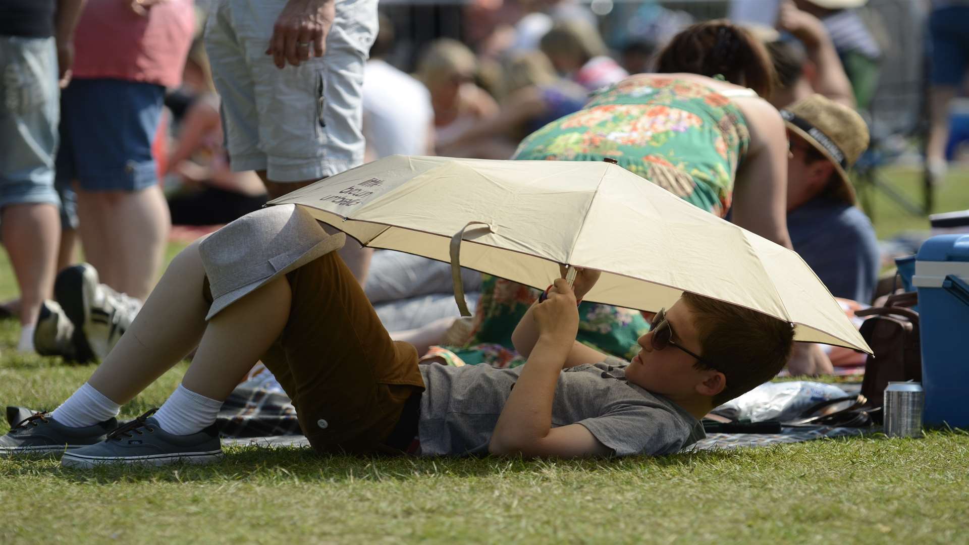 A music festival goer stays cool. Library picture