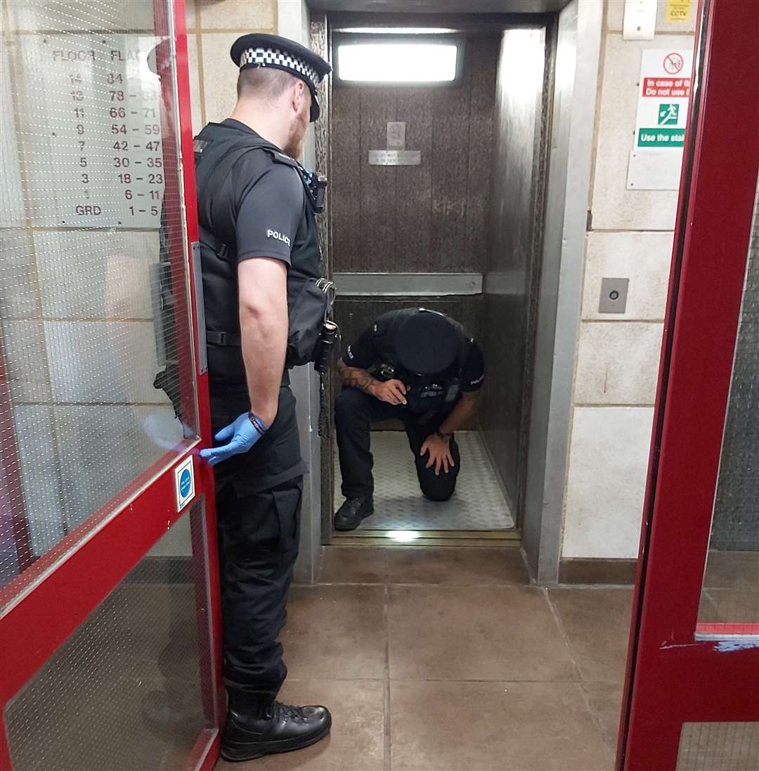 Officers looking inside a lift at the tower block. Picture: Kent Police Thanet / Twitter