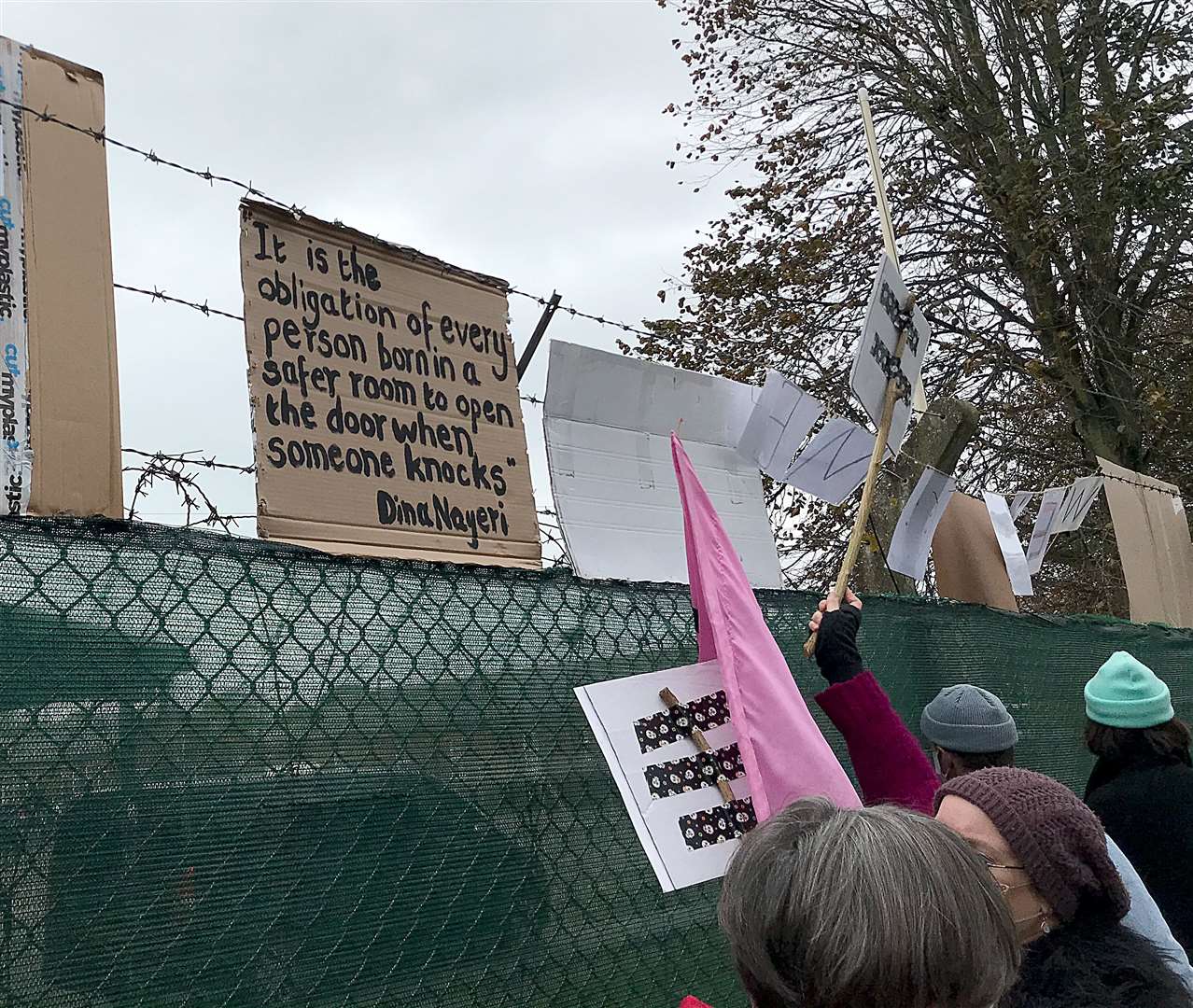 Pro-migrant demonstrators outside Napier Barracks in Folkestone, Kent, gathered in a show of support welcoming migrants to the area (Michael Drummond/PA)