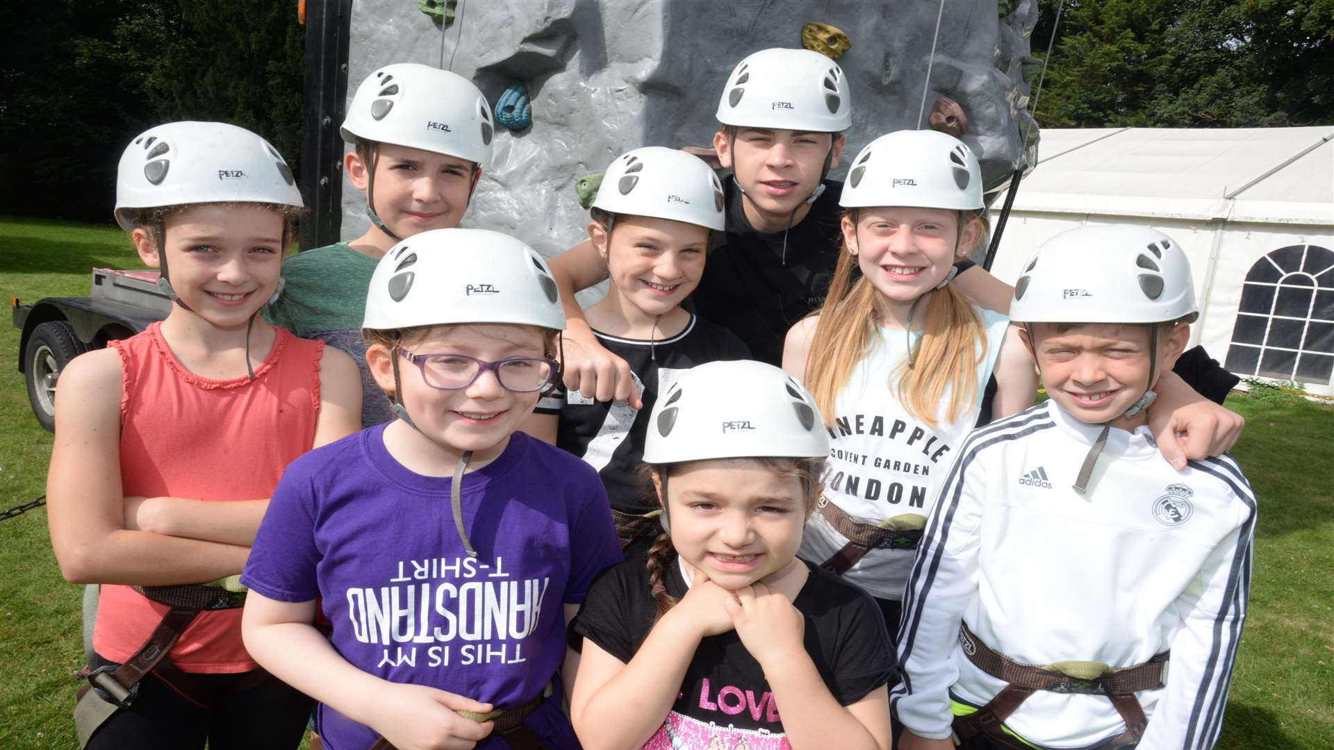 Some of the intrepid youngsters who tackled the climbing wall at the Acacia Hall