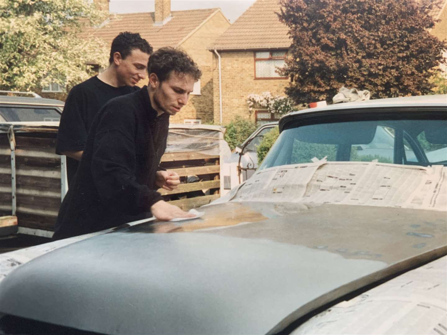 Ross Hutchinson and his late brother Ryde working on the Chrysler