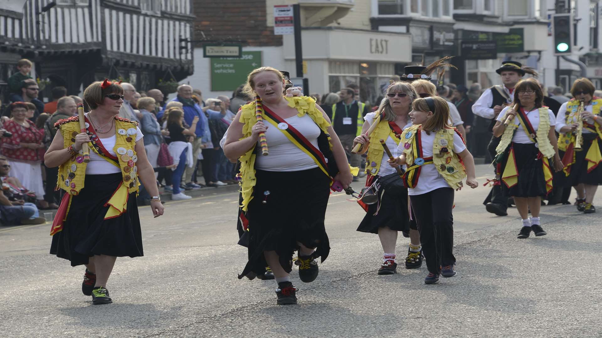 Dancers head up the High Street in the main parade