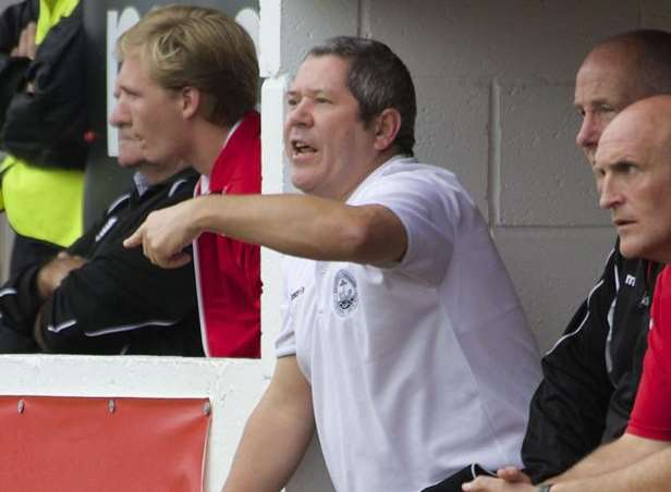 Hythe Town manager Tim Dixon in the dugout at Ebbsfleet Picture: Andy Payton