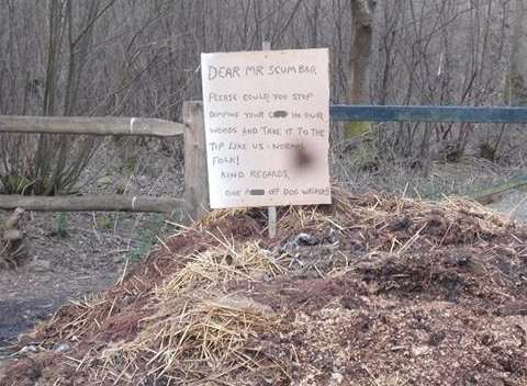 The angry sign was left in the pile of manure. Pic by Ted Relf.