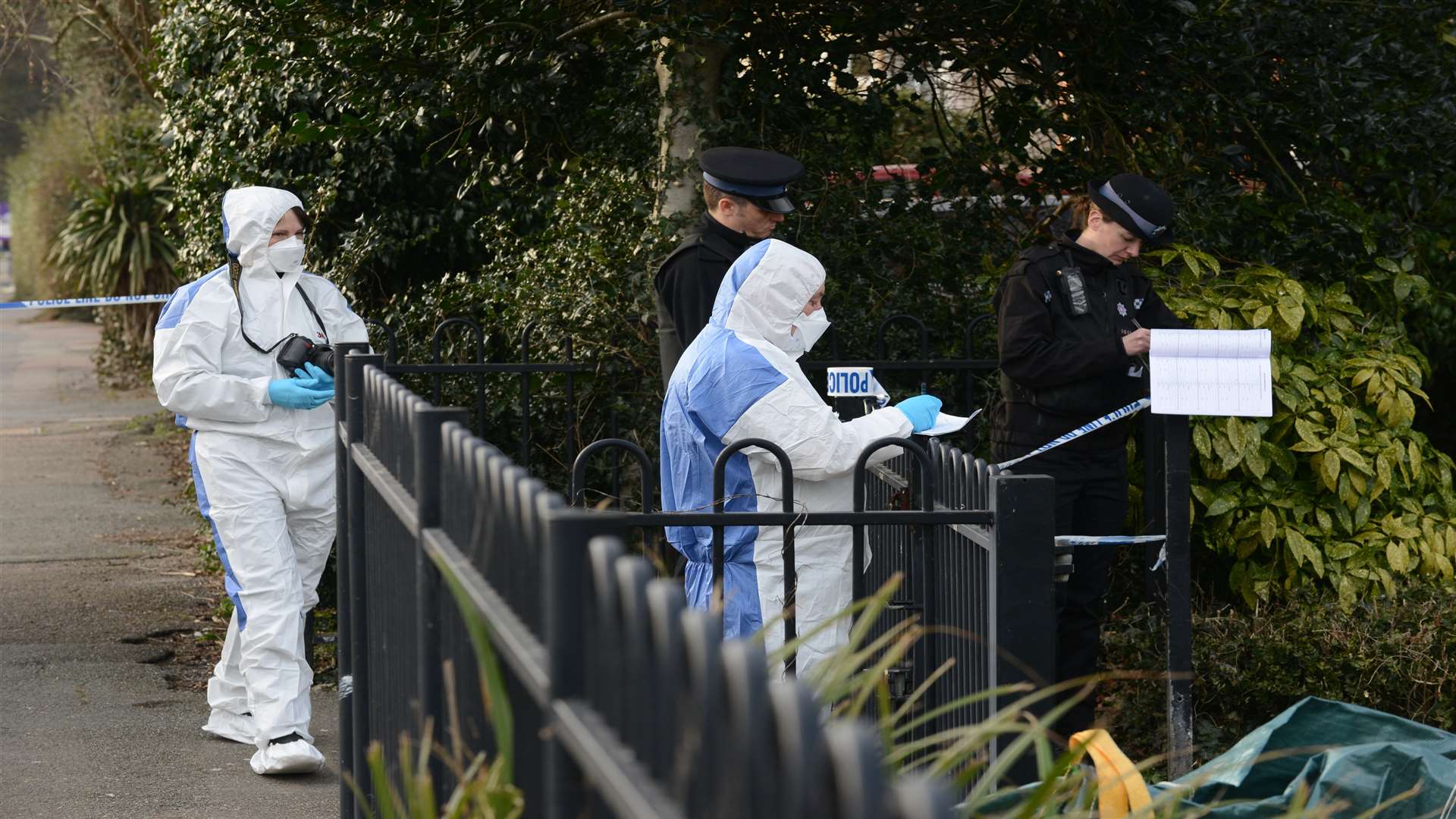 Police and forensic teams searched the area after the stabbing in March. Picture: Gary Browne