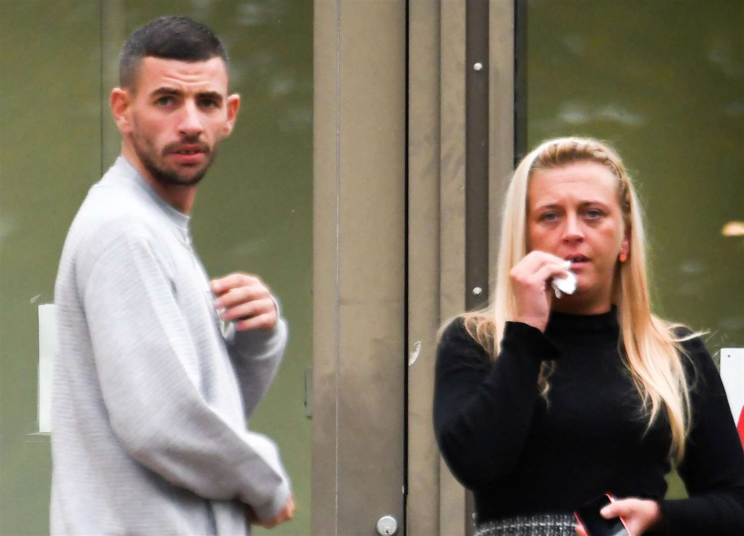Dangerous dog owner Michael Thornton, standing with Hayley Eldridge, has been jailed after failing to appear for his sentencing. Picture: Steve Finn