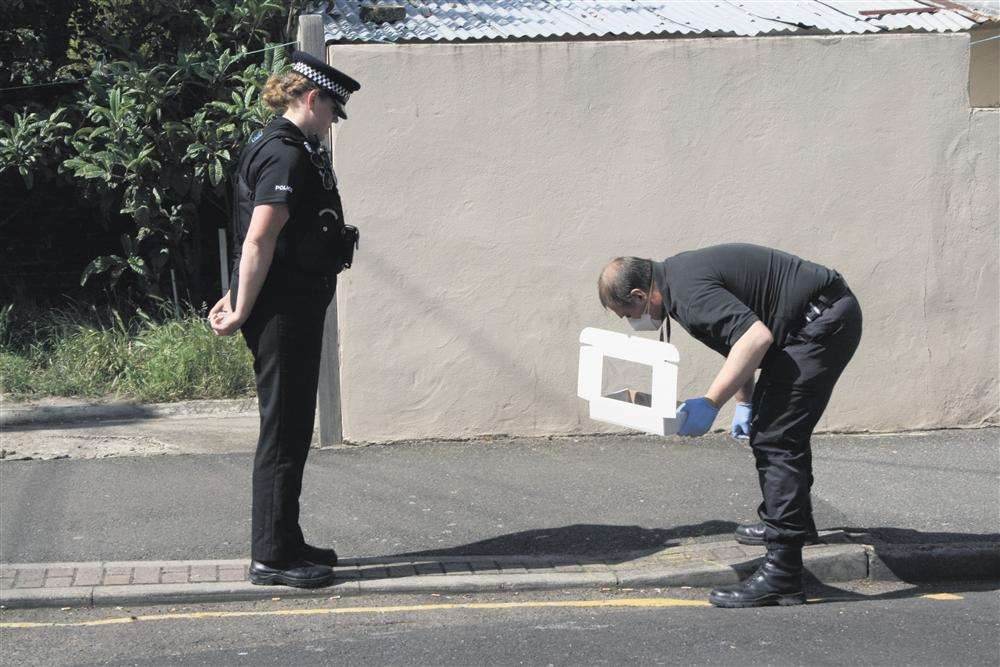 Forensic officers in Stuart Road, Gillingham